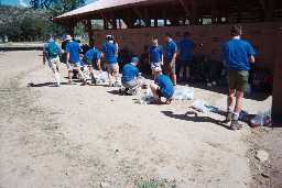 Sorting food outside Camping Services