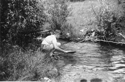 Panning for Gold in one of Philmont's creeks, likely near Dean Cow. Circa 1941.