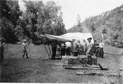 In the 1940s, Chuck-wagons followed crews on the trail.  This scene is likely near Dean Cow in the early 1940s