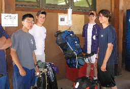 Weighing packs at Welcome Center