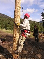 Spar pole climbing at Crater Lake